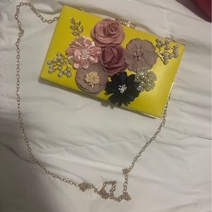 Flower, gem, and pearl clutch